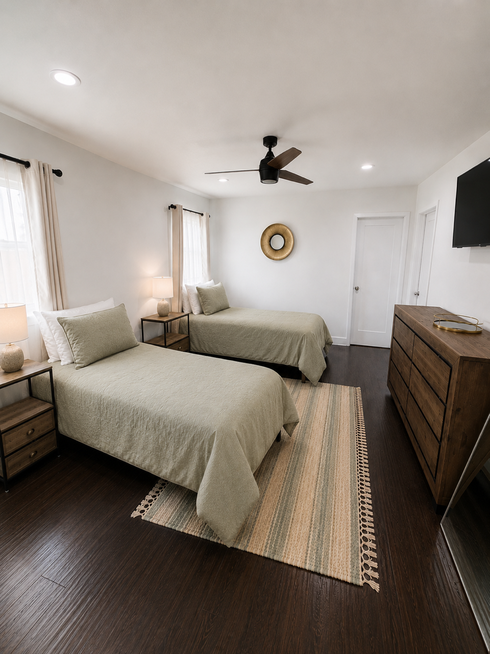 Shared bedroom with sage bedding